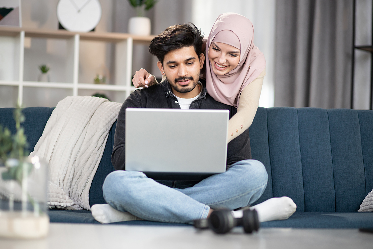 Happy,Multiethnic,Couple,,Handsome,Bearded,Guy,And,Muslim,Woman,In